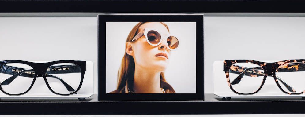 Top Vision Instore glasses display branding